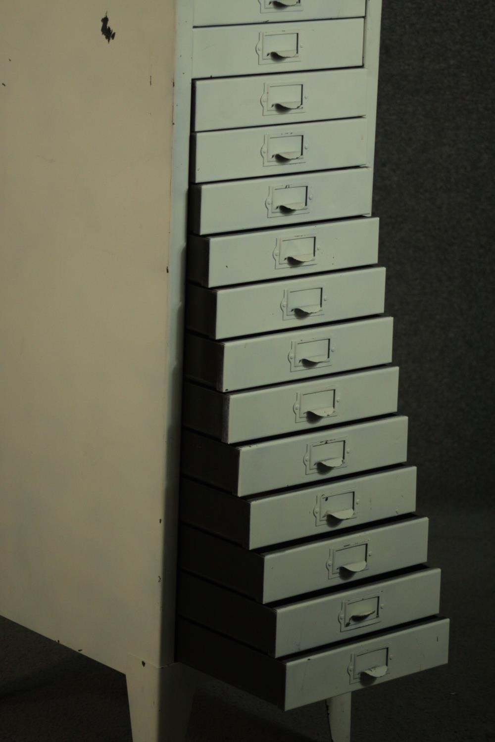 A 20th century white painted steel filing cabinet, with fifteen drawers, on tapering backet legs. - Image 5 of 5