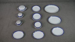 A part six person blue scale, white and gold foliate design dinner service, with oval serving