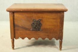 A 19th century continental trunk, with a rising lid, enclosing a candle box, above an ornate iron