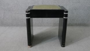 An Art Deco ebonised Ministool piano stool. H.50 W.52 D.35cm