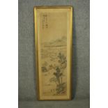 A framed and glazed Chinese 19th century watercolour of a mountain landscape with farmer, cart and