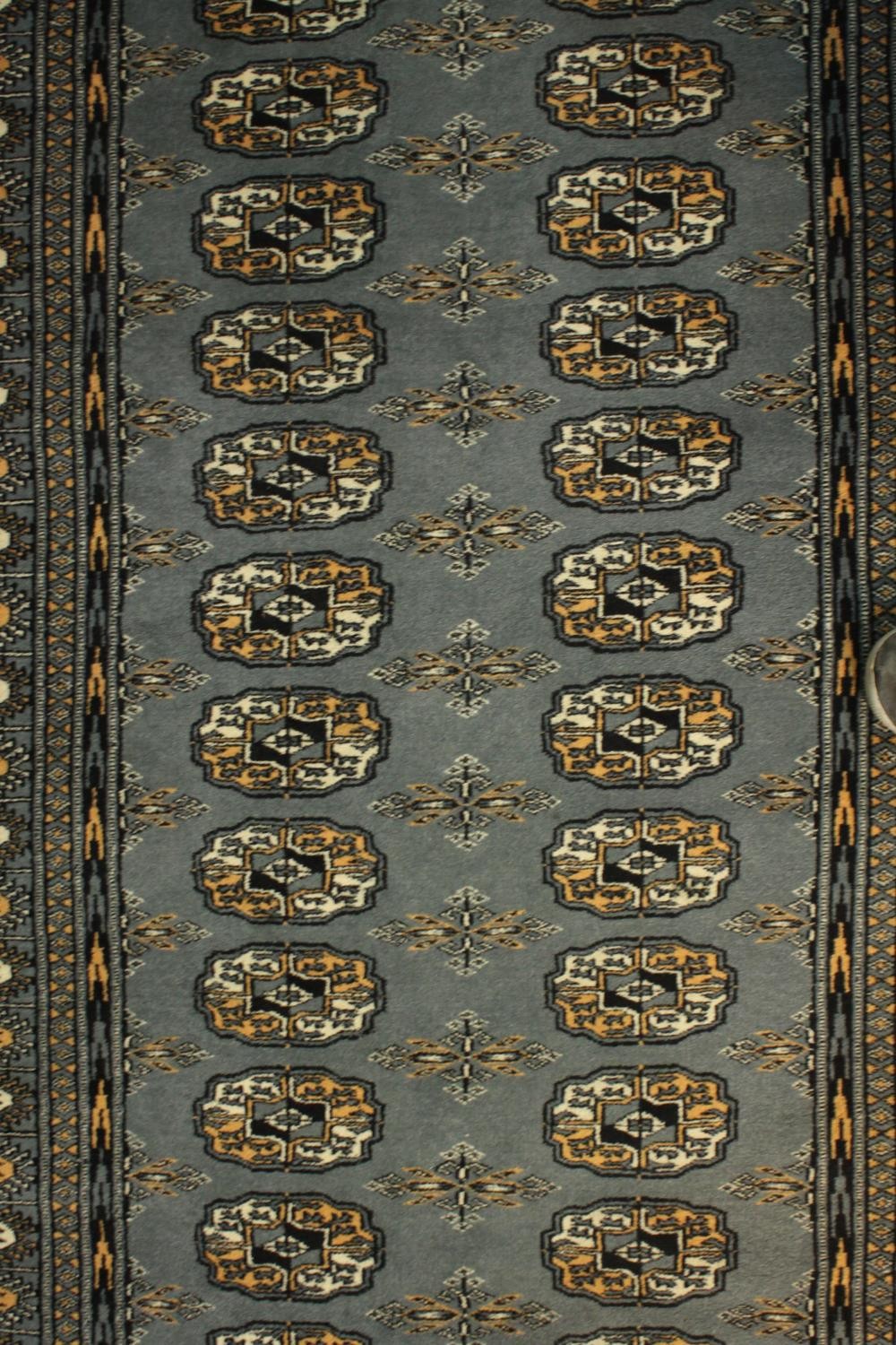 A Pakistan Bokhara blue ground hand made rug. L.160 W.97cm. - Image 3 of 5