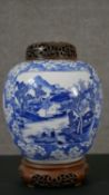 A Chinese blue and white porcelain vase of ovoid form, with two pictorial reserves, one depicting
