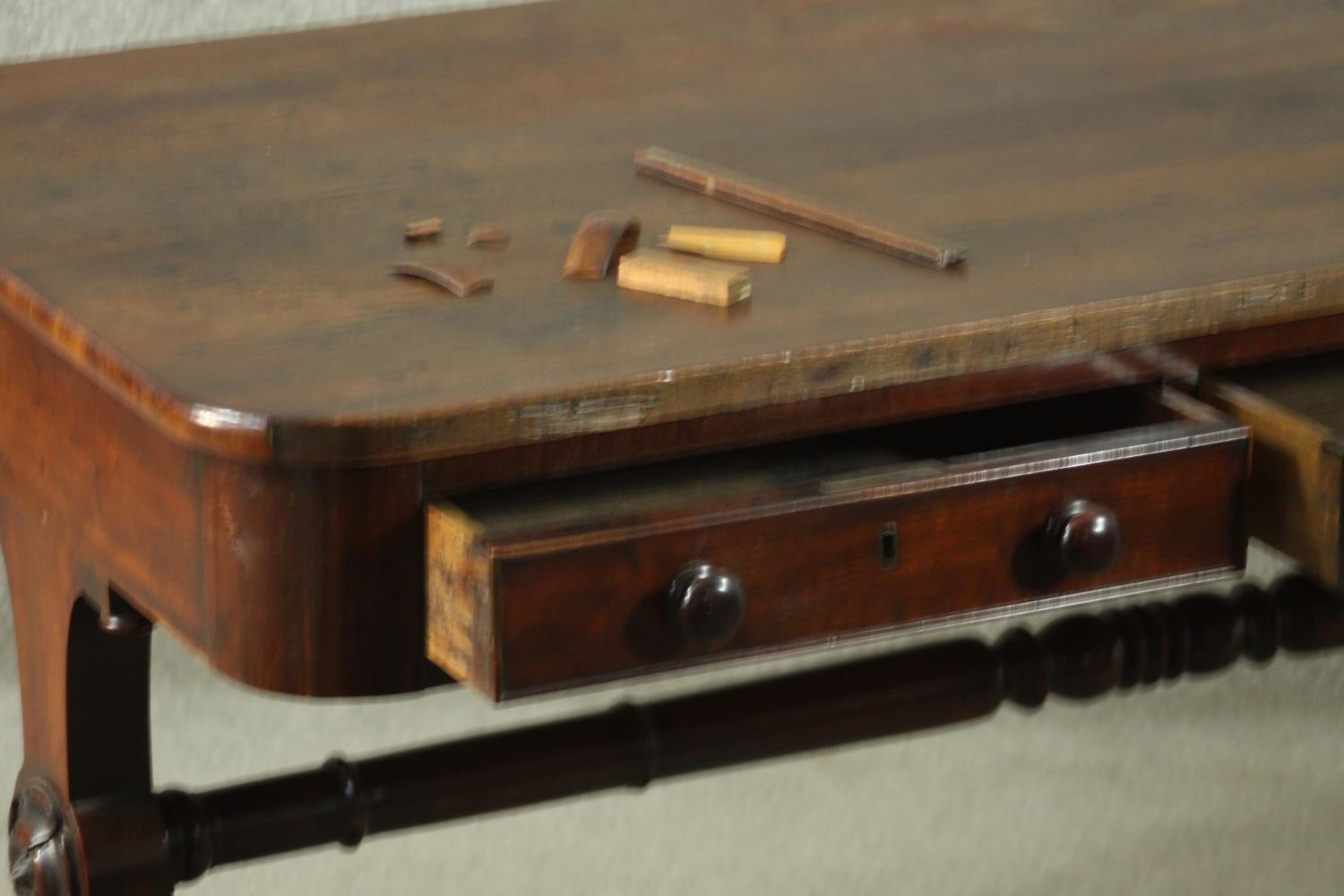 A Victorian mahogany library table, with three short drawers, over end supports joined by a turned - Image 5 of 9