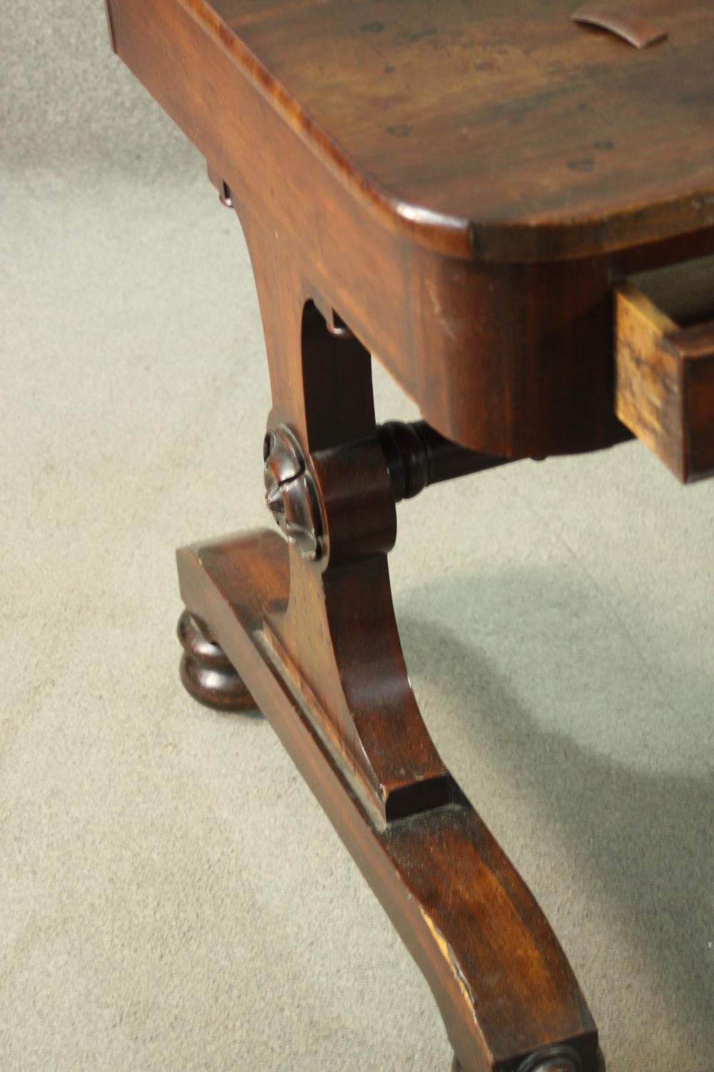 A Victorian mahogany library table, with three short drawers, over end supports joined by a turned - Image 8 of 9