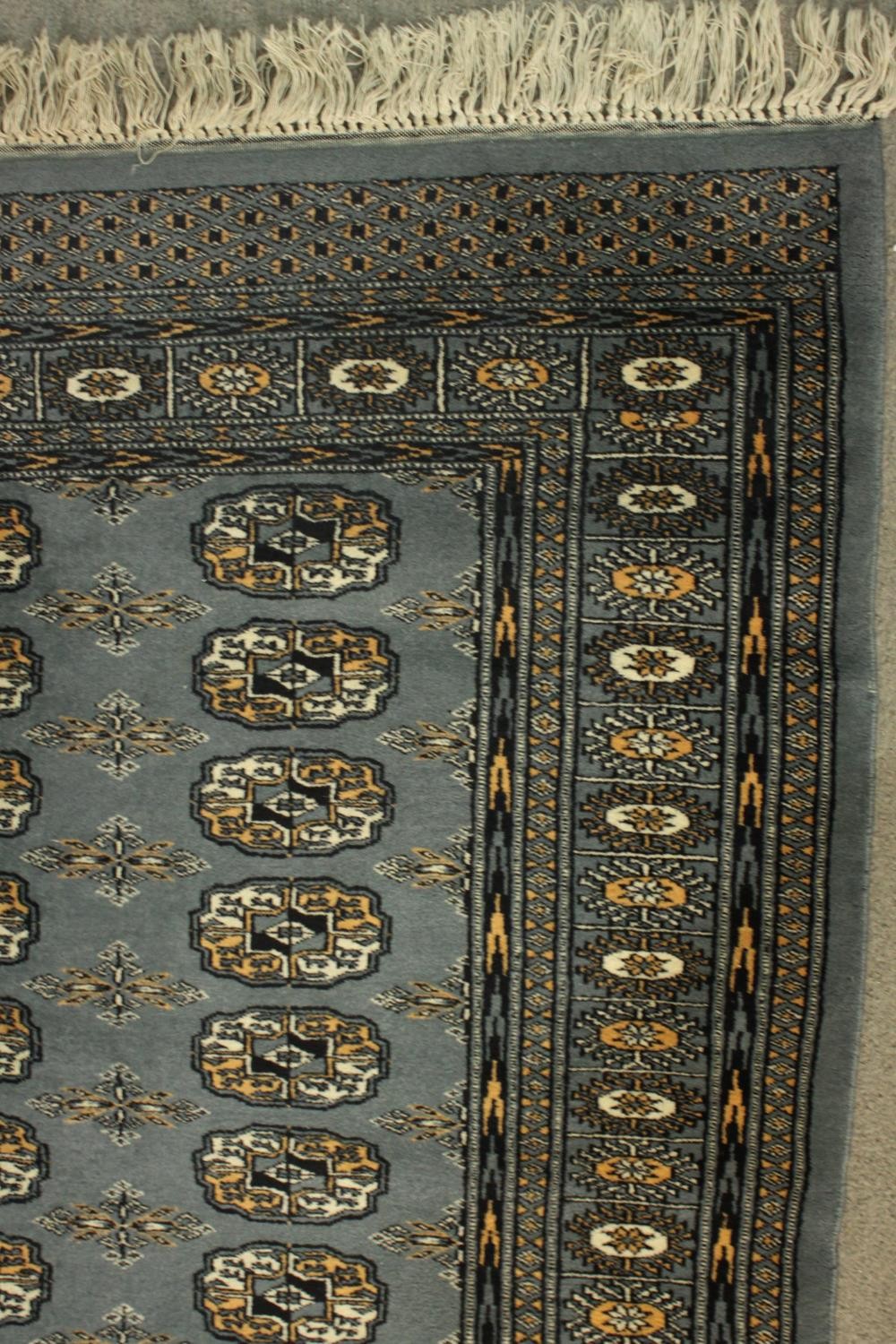 A Pakistan Bokhara blue ground hand made rug. L.160 W.97cm. - Image 4 of 5