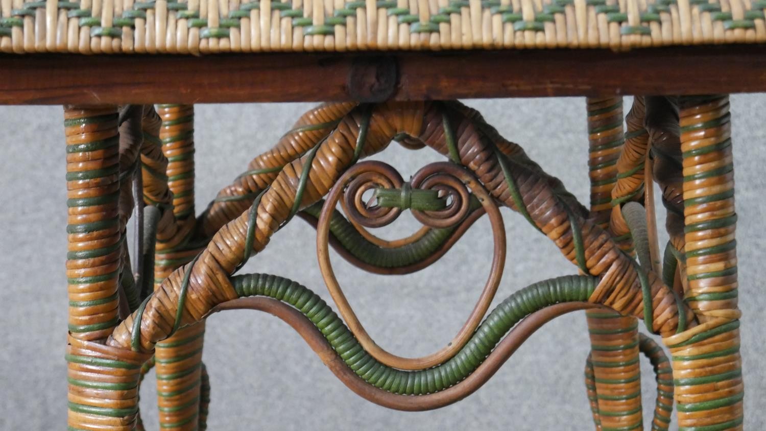 A wicker occasional table, the square top with green foliate Art Nouveau tiles, the splayed legs - Image 3 of 7