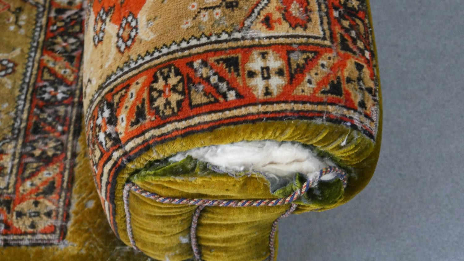 A late Victorian Chesterfield sofa, upholstered in green velvet, with sections of Persian Sarouk - Image 5 of 6