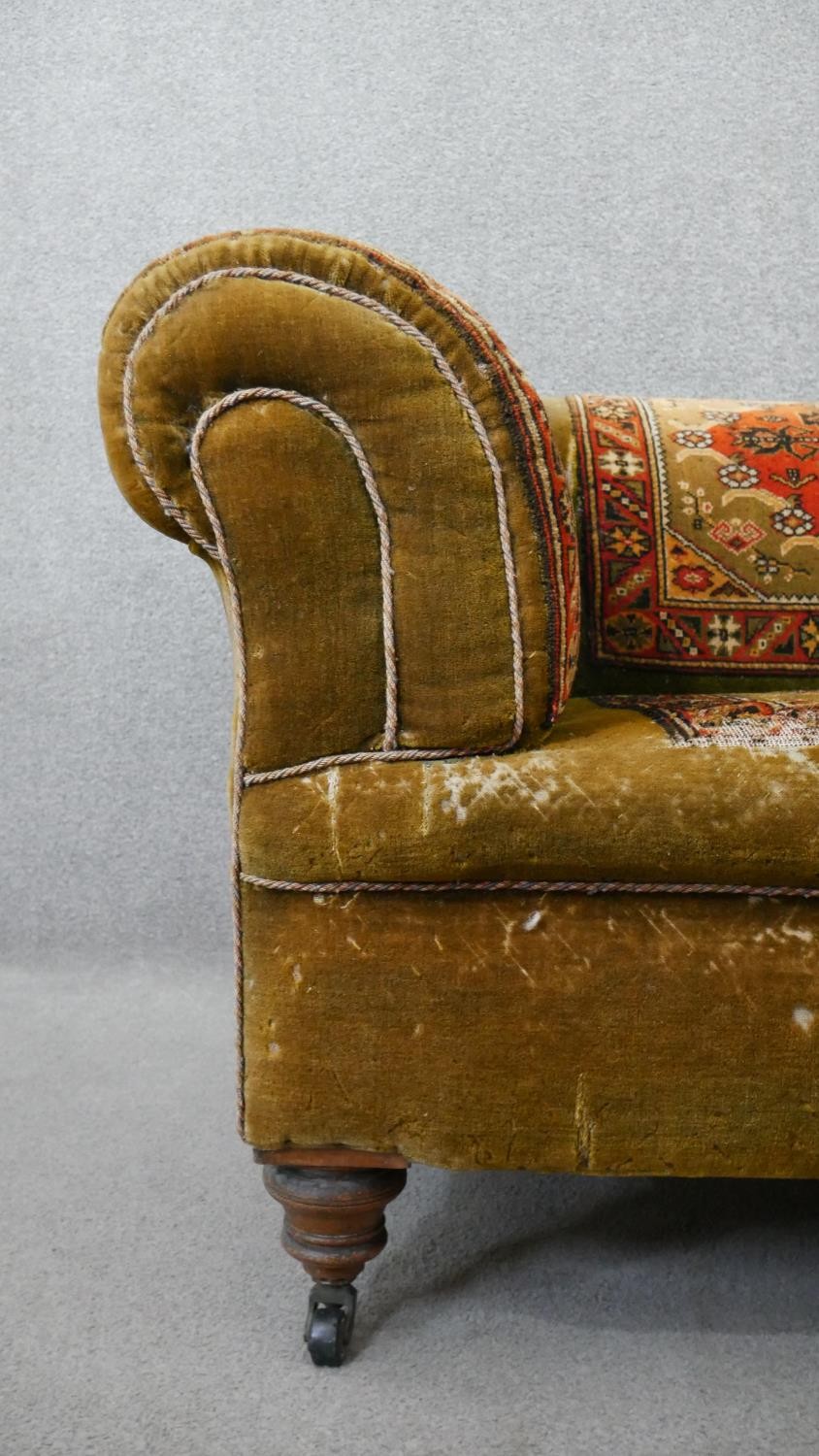 A late Victorian Chesterfield sofa, upholstered in green velvet, with sections of Persian Sarouk - Image 3 of 6