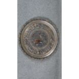 An Egyptian Cairo ware brass tray with Pharaoh head design and Egyptian symbols. Diam.48cm