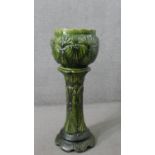 A Victorian green glazed majolica sea shell design planter with matching pedestal base. Impressed