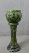 A Victorian green glazed majolica sea shell design planter with matching pedestal base. Impressed