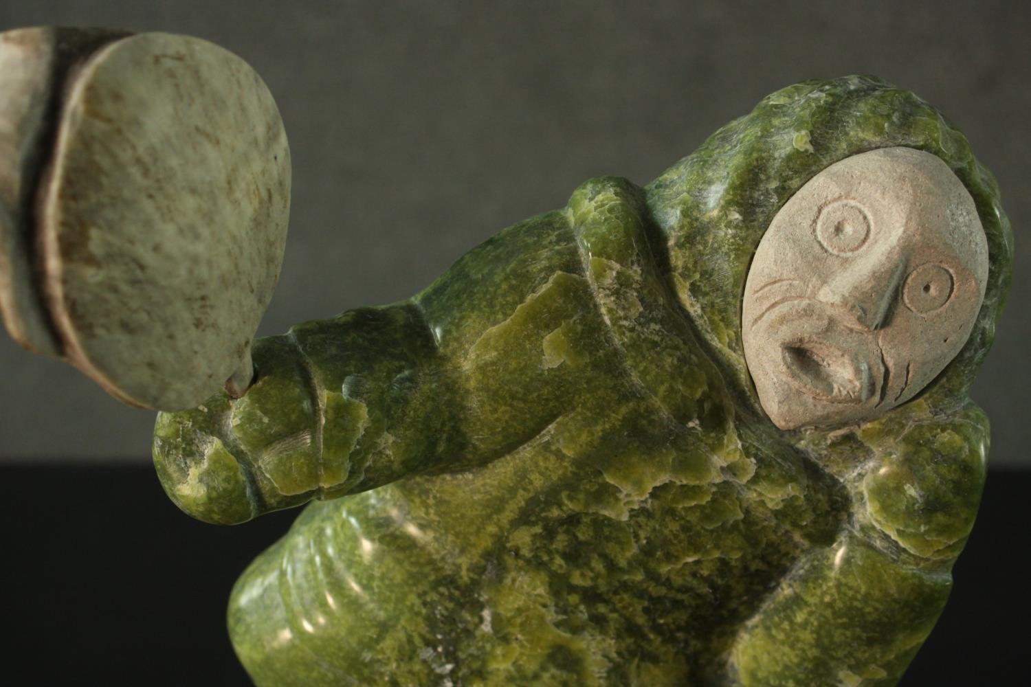 Aisa Amittu, Inuit, 1951, a carved green soapstone and granite drum dancer sculpture, with bone - Image 4 of 9