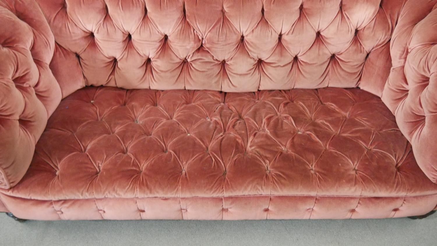 A Victorian Chesterfield sofa, upholstered in pink velour, buttoned to the back, arms, seat and - Image 2 of 6