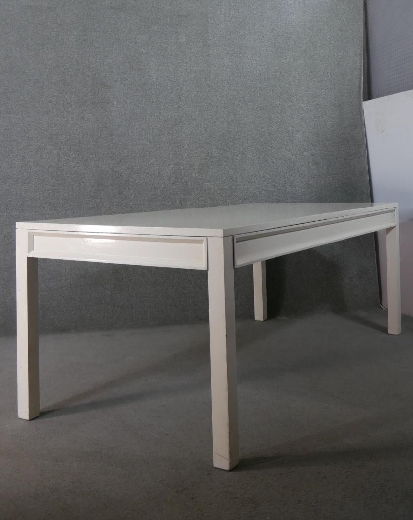 A contemporary white painted wood dining table, of rectangular form, on square section legs. H.75 - Image 4 of 4