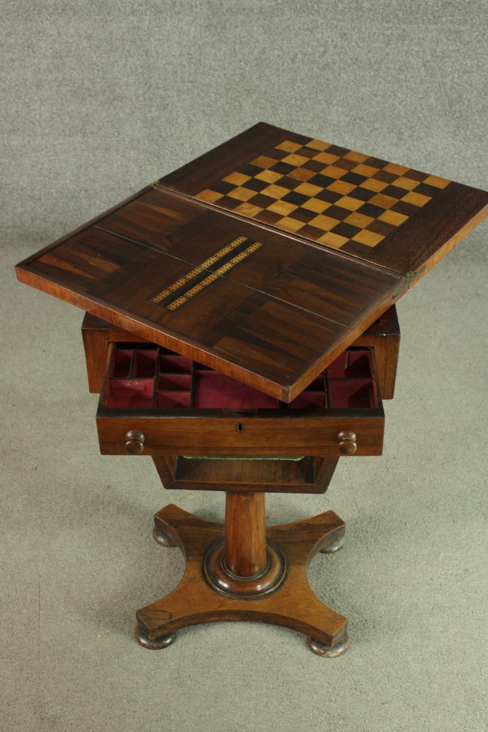 A Victorian rosewood games and sewing table, the rectangular fold out top with inlaid chess and - Image 8 of 9