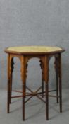 A circa 1900 Liberty & Co Anglo-Mooresque octagonal table, the top with yellow tiles, on eight