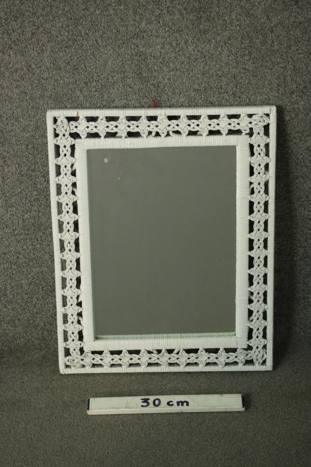 A white painted woven rattan framed mirror, with a rectangular mirror plate. H.53 W.43cm. - Image 2 of 4