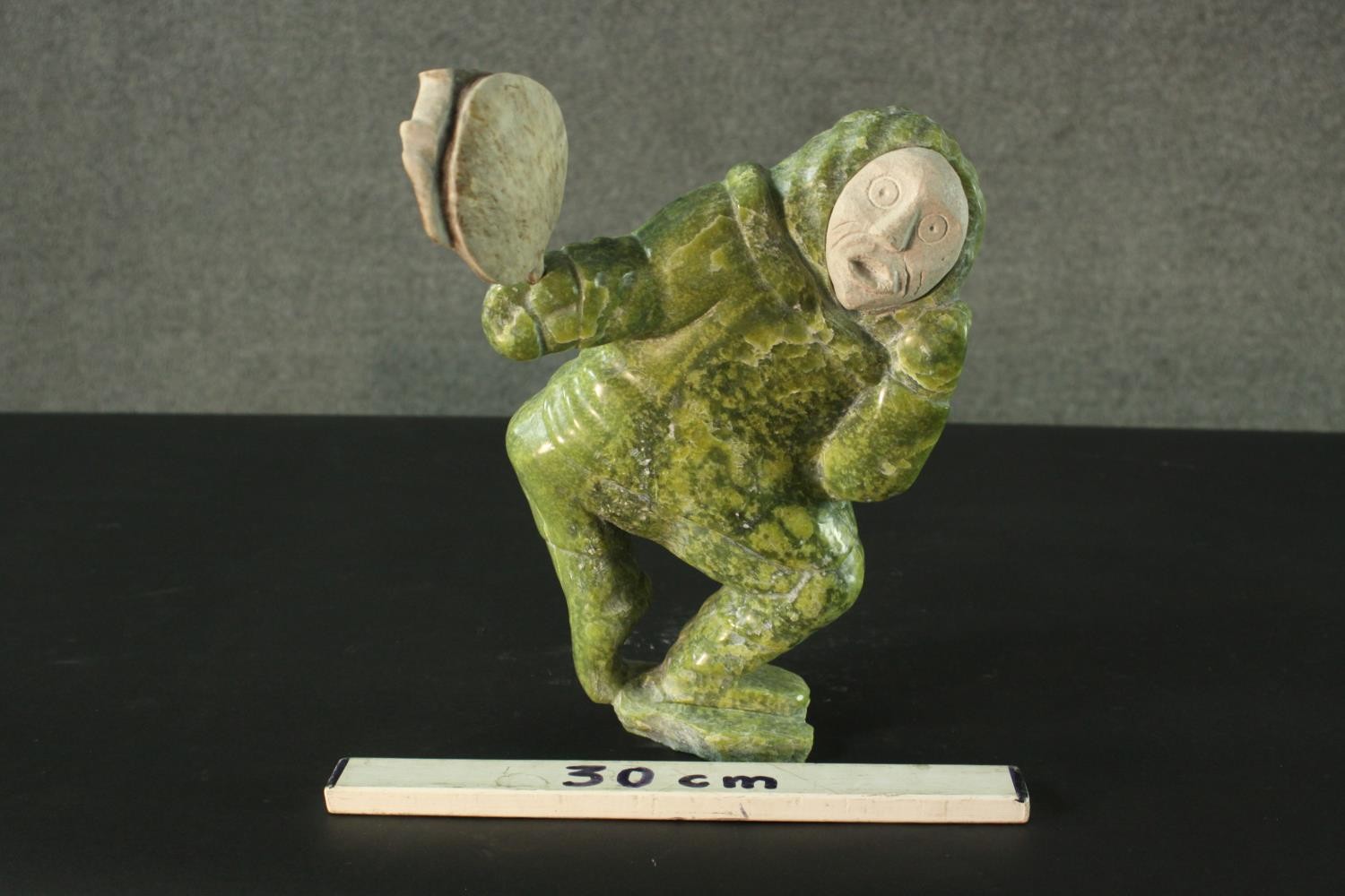 Aisa Amittu, Inuit, 1951, a carved green soapstone and granite drum dancer sculpture, with bone - Image 2 of 9