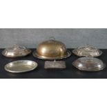 A collection of silver plate lidded serving dishes, tray with cloche and warmer. H.23 W.32 D.43cm (