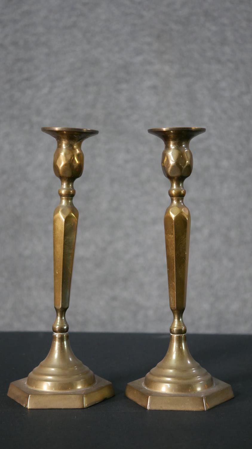 A collection of brass, including a pair of brass candlesticks with faceted design, a brass hand bell - Image 2 of 6
