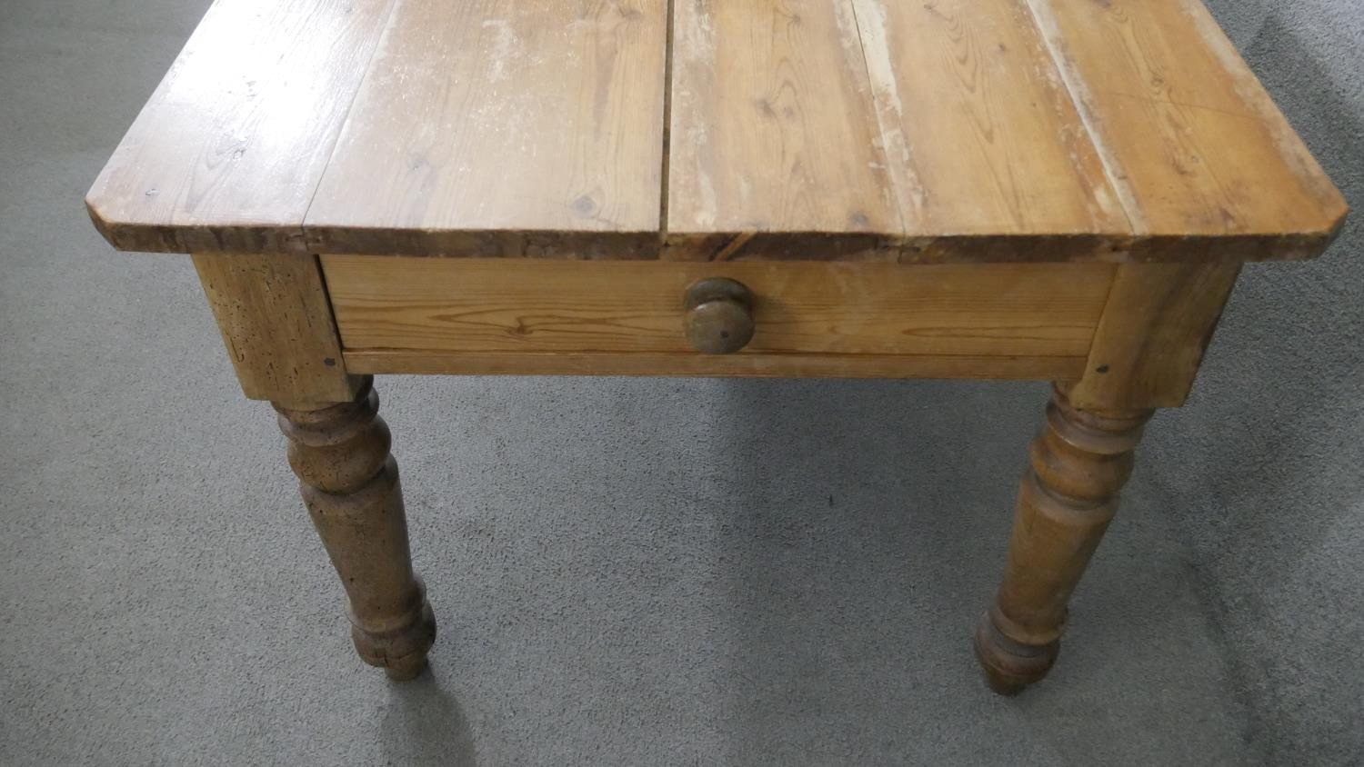 A Victorian pine kitchen table, the rectangular plank top over an end drawer with a knob handle, - Image 7 of 8