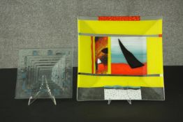 Two Art Glass square dishes, one with a bold colourful abstract design. L.40 W.40cm.