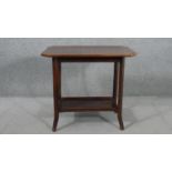 A circa 1900s fruitwood occasional table, the rectangular top with canted corners, over an