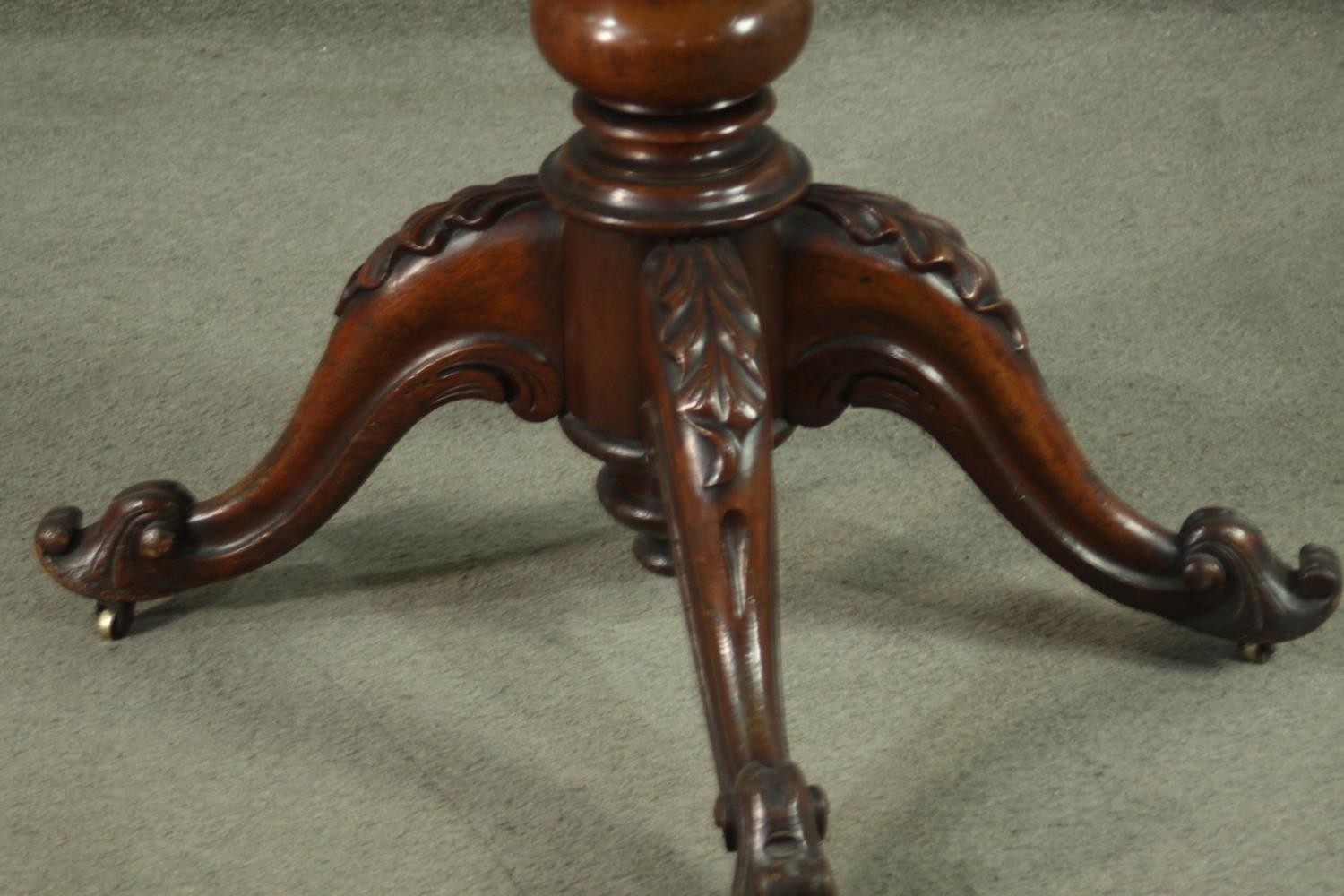 A Victorian figured walnut tea table, with a foldover top, over a baluster stem, on a quatraform - Image 7 of 7