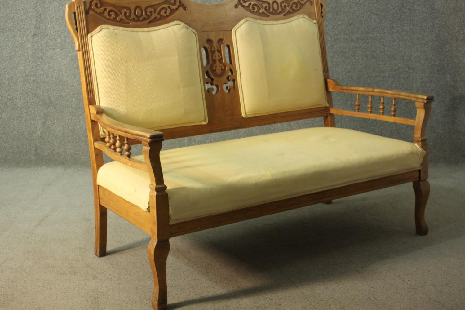 An Arts & Crafts fruitwood two seater sofa, the back rail carved with oak leaves and acorns, - Image 4 of 8