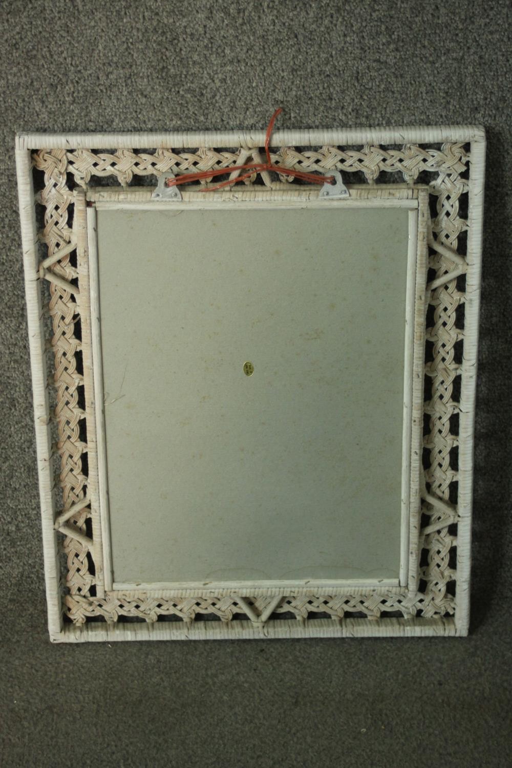 A white painted woven rattan framed mirror, with a rectangular mirror plate. H.53 W.43cm. - Image 4 of 4