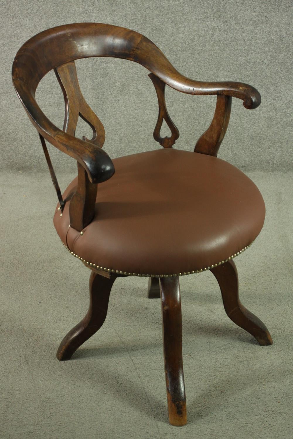 An Edwardian fruitwood swivel desk chair, with a curved back and heart pierced splat, over a - Image 2 of 6