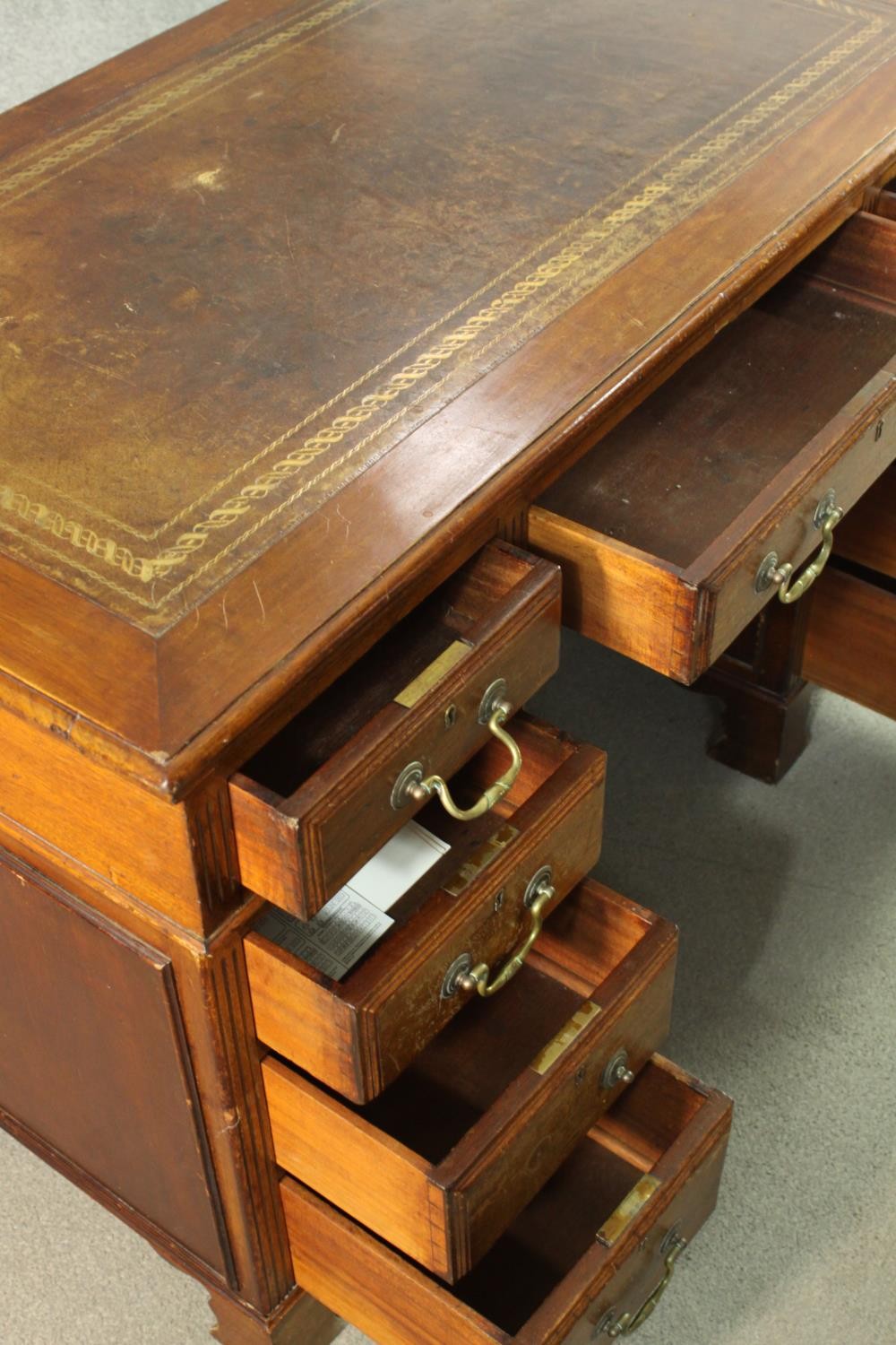 A walnut pedestal desk, with a tooled leather skiver over an arrangement of nine graduated - Image 7 of 8