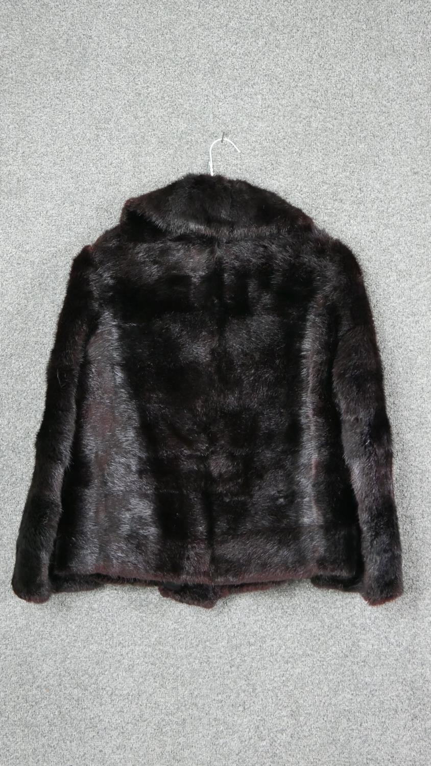 A ladies vintage short brown mink coat, retailed by Morgans, black silk lining embroidered with - Image 4 of 6