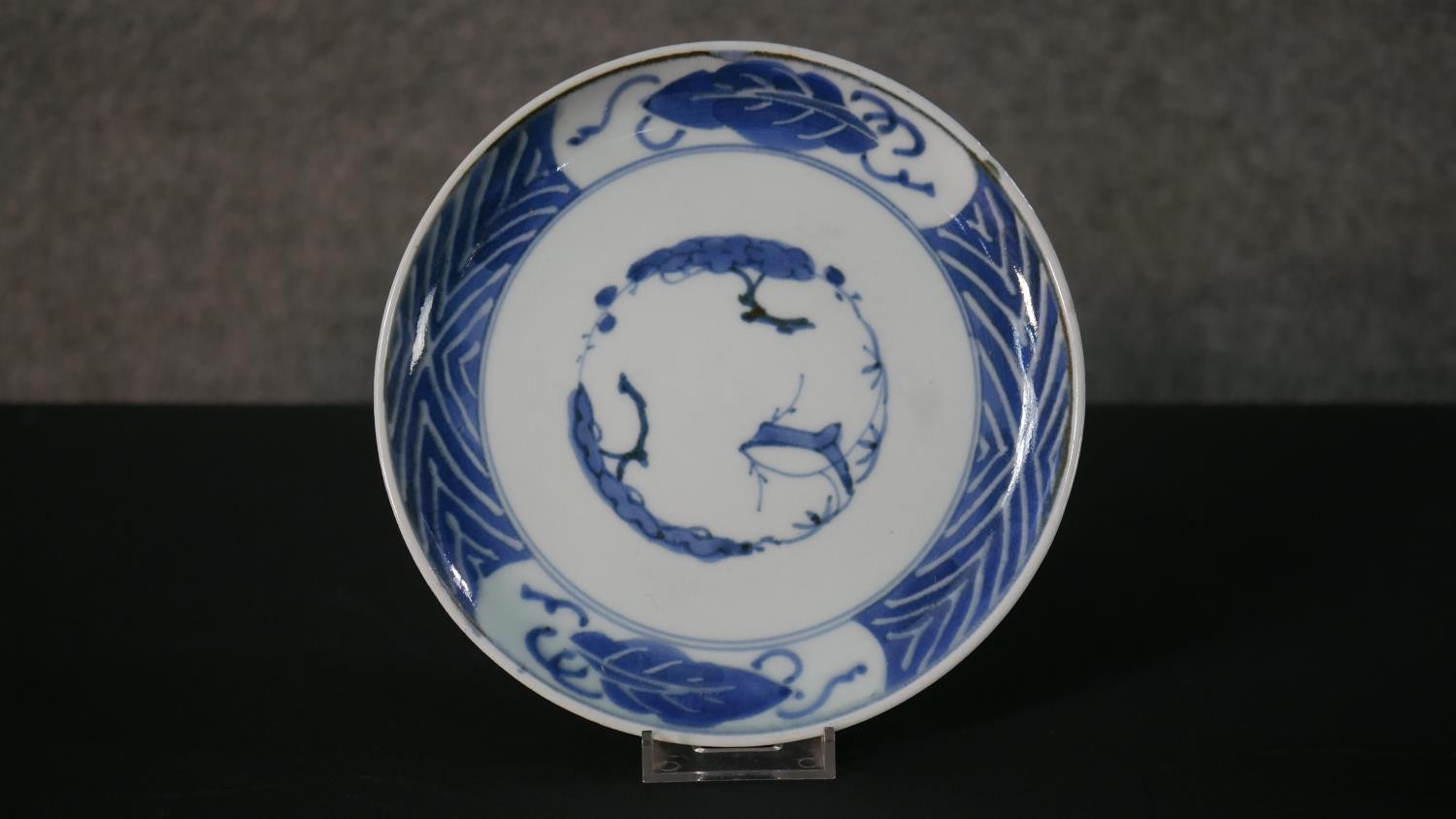 A pair of Japanese Edo period hand painted blue and white porcelain plates with tree and foliate - Image 2 of 11