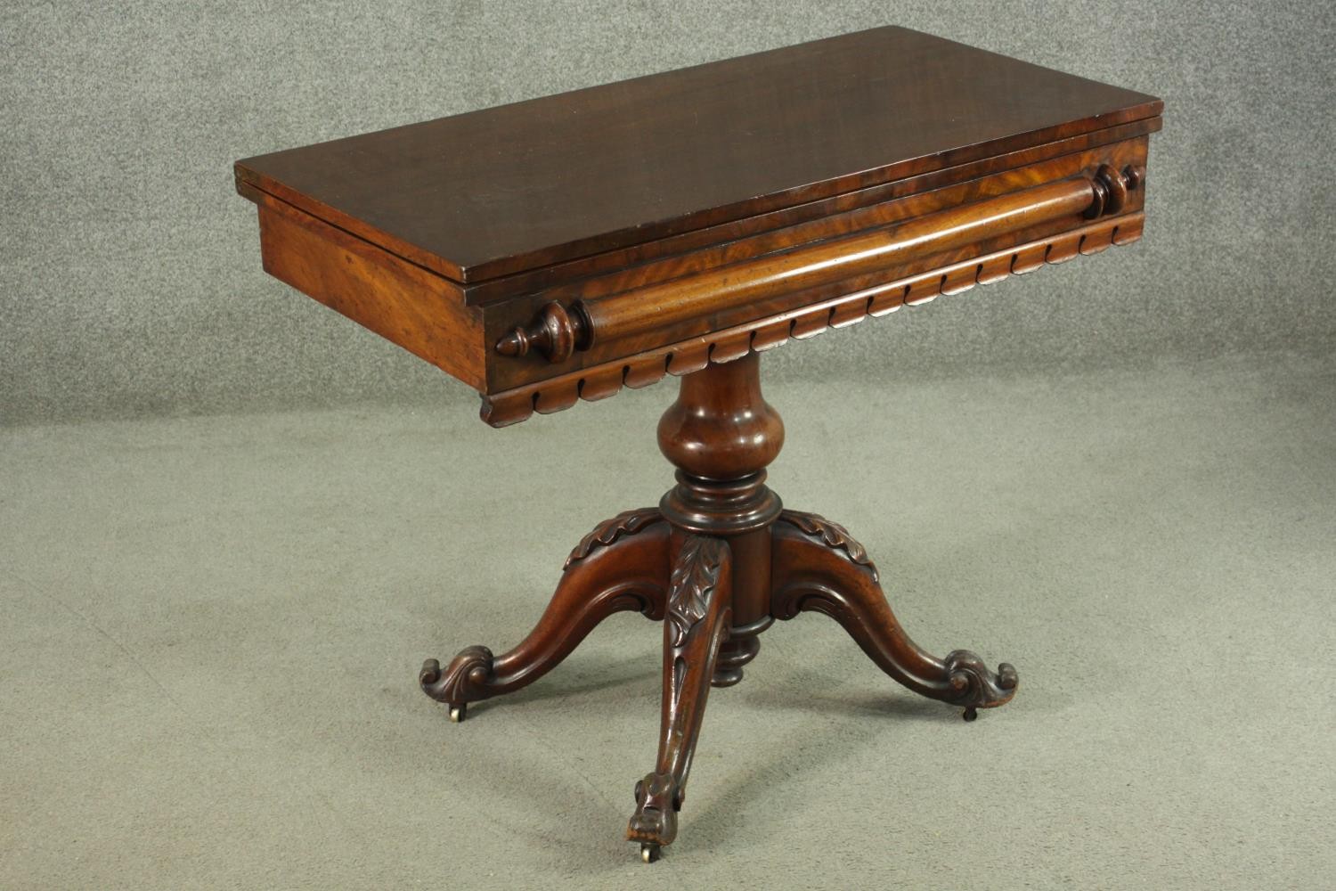 A Victorian figured walnut tea table, with a foldover top, over a baluster stem, on a quatraform - Image 3 of 7