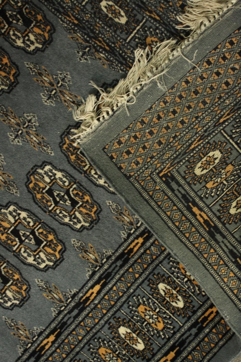 A Pakistan Bokhara blue ground hand made rug. L.160 W.97cm. - Image 5 of 5