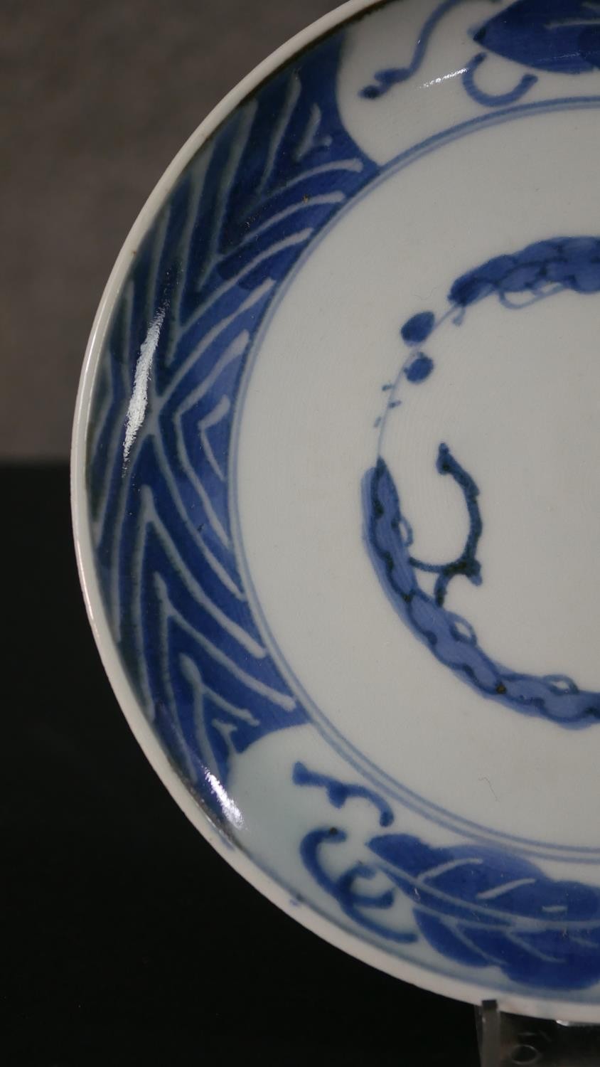 A pair of Japanese Edo period hand painted blue and white porcelain plates with tree and foliate - Image 4 of 11