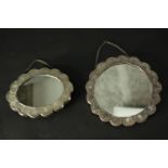 Two Turkish repousse design silver wedding mirrors with scalloped edges and raised floral and
