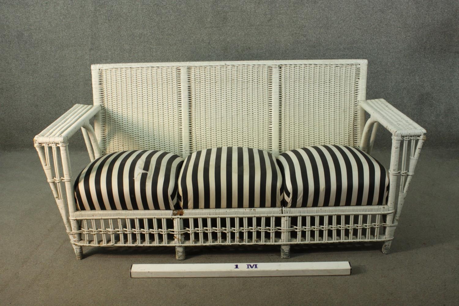 A white painted rattan garden three seater sofa, of woven construction, with a black and white - Image 2 of 9