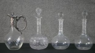 A collection of glassware, including a silver plated floral and foliate deign claret jug with spiral