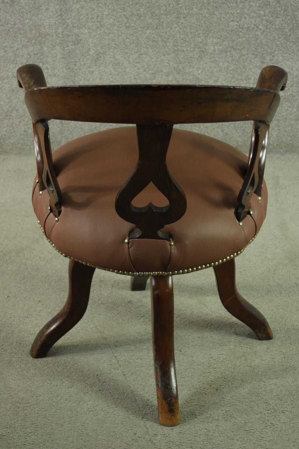An Edwardian fruitwood swivel desk chair, with a curved back and heart pierced splat, over a - Image 4 of 6