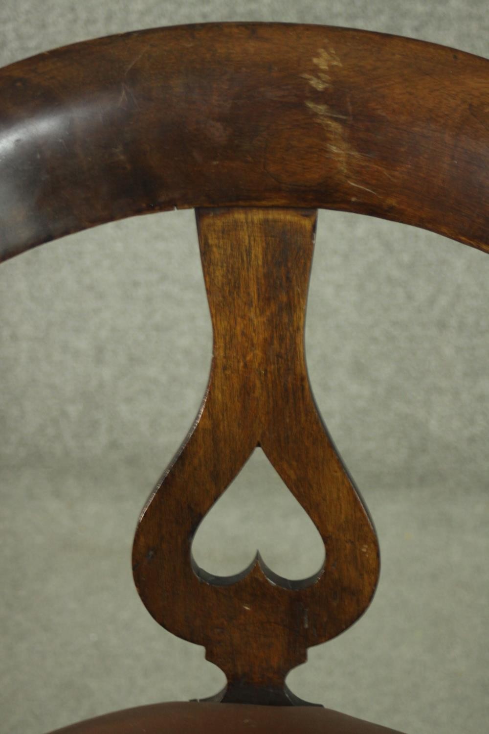 An Edwardian fruitwood swivel desk chair, with a curved back and heart pierced splat, over a - Image 5 of 6