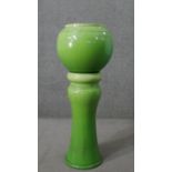 A Victorian green glazed majolica globe planter and pedestal stand. H.94 W.35cm (on stand)