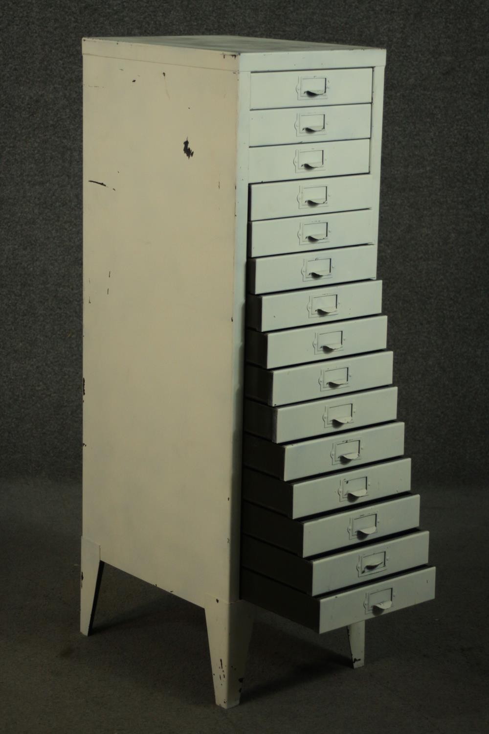 A 20th century white painted steel filing cabinet, with fifteen drawers, on tapering backet legs. - Image 4 of 5