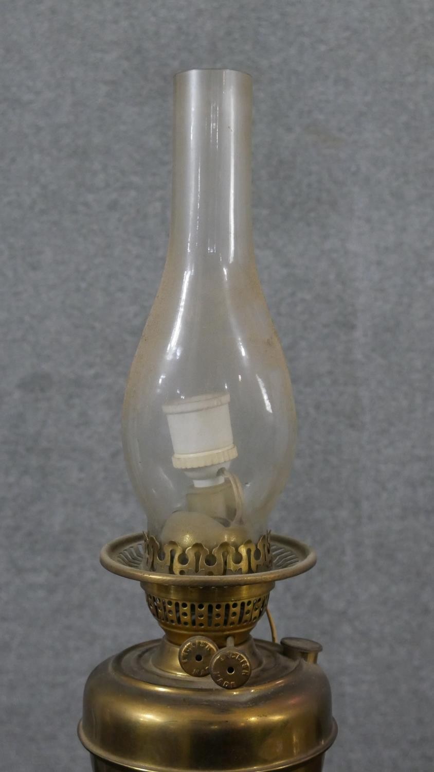 A Victorian brass converted oil lamp, with a globular etched glass shade. H.52 W.15cm - Image 6 of 6