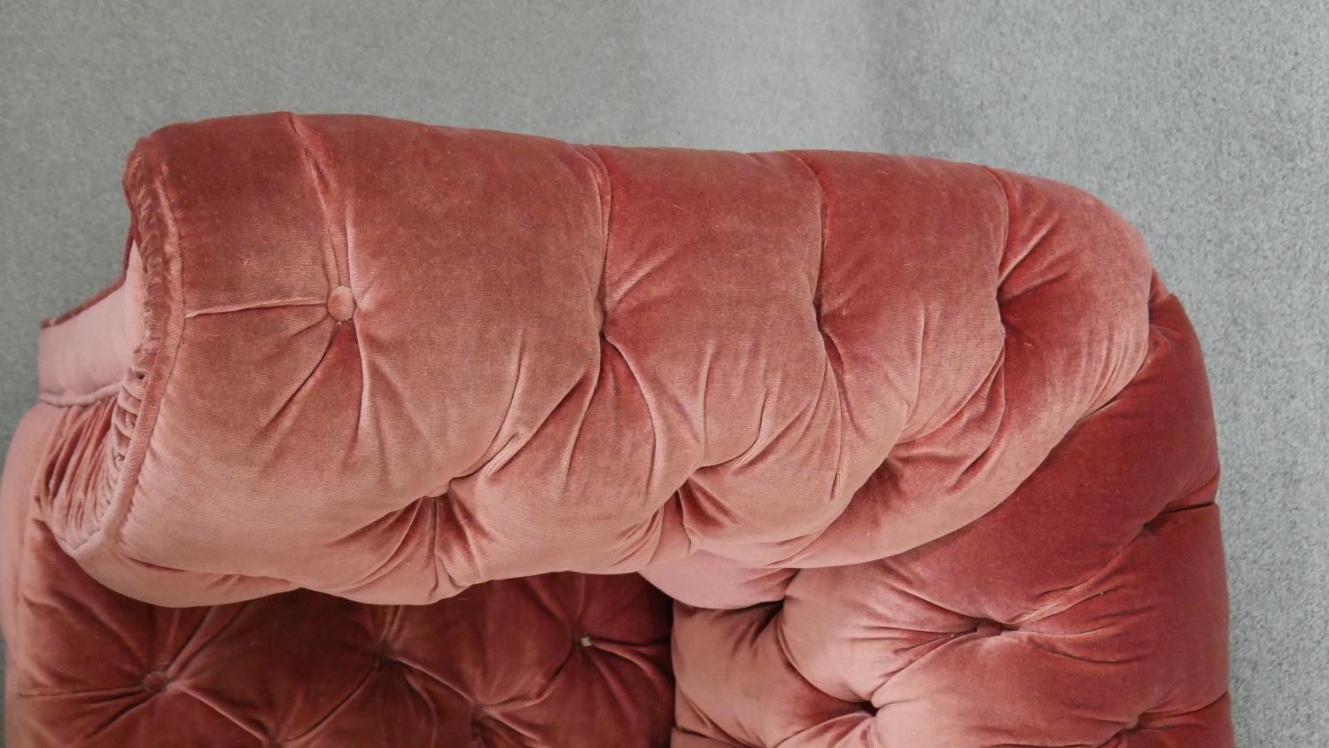 A Victorian Chesterfield sofa, upholstered in pink velour, buttoned to the back, arms, seat and - Image 5 of 6