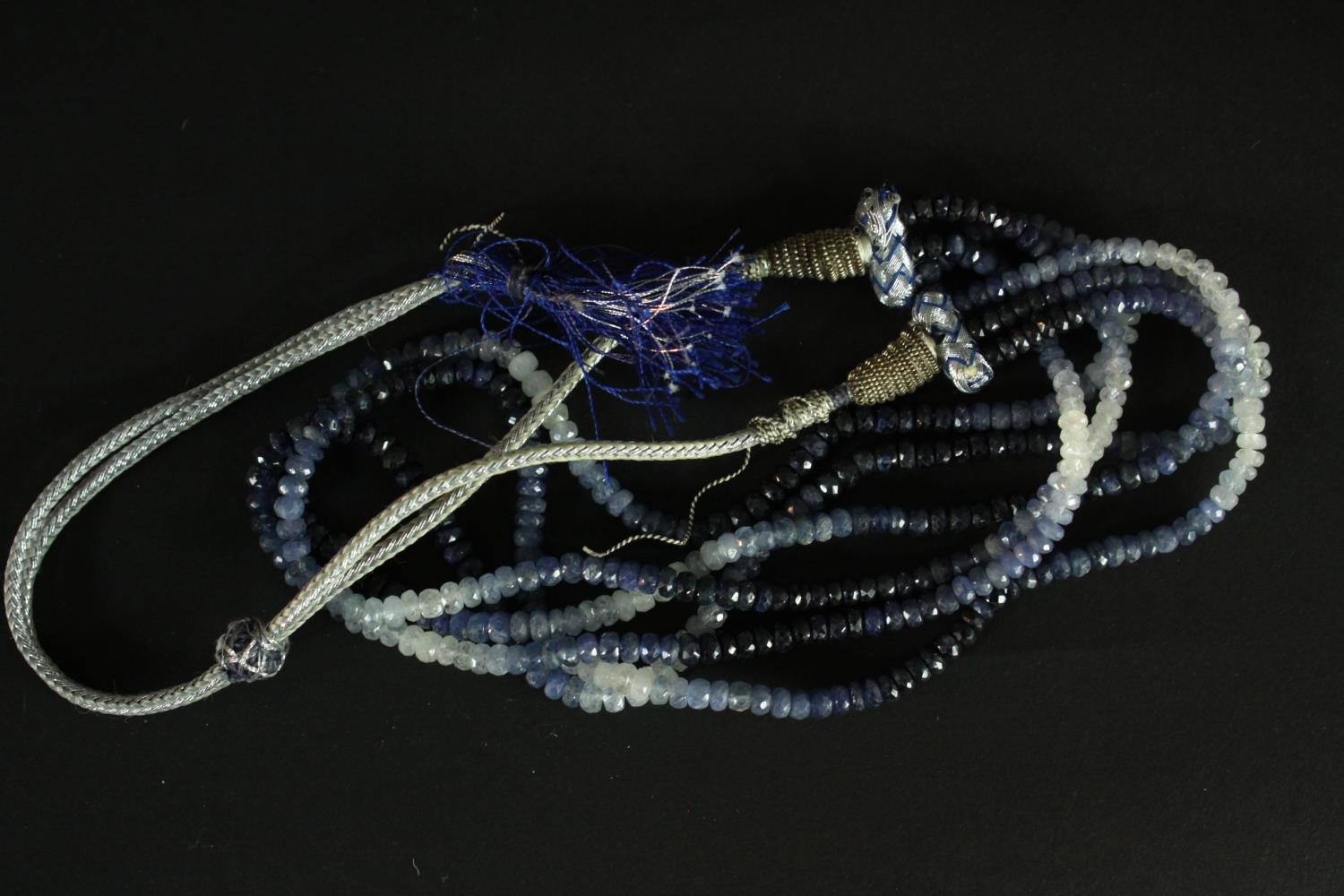 A boxed group of necklaces, including: a sapphire and white sapphire facetted bead necklace, an - Image 6 of 11