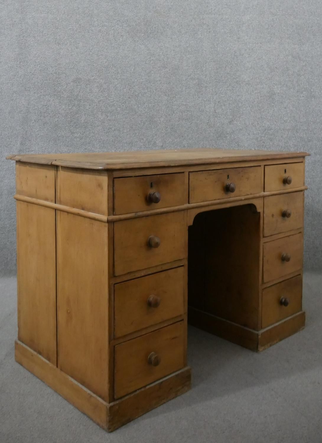 A Victorian pine kneehole desk, the rectangular top with a moulded edge, over an arrangement of nine - Image 6 of 6