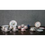 A collection of early 20th century hand painted and transfer printed fine china cups and saucers,
